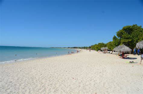 Playa Ancon ir jūros horizonte.