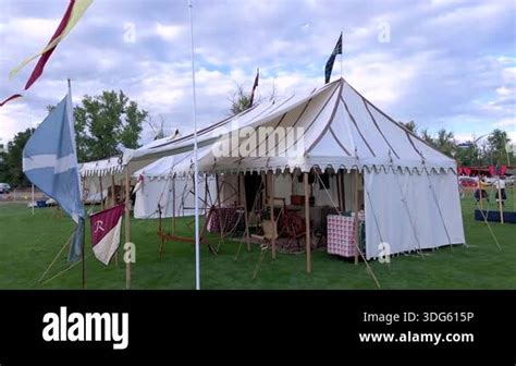 decorated tent with cords and flags