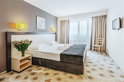 Dangė Hotel kambariai ir interjeras infografika