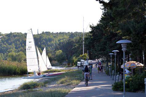 Kuršių nerijos peizažas ir vandens dviračiai